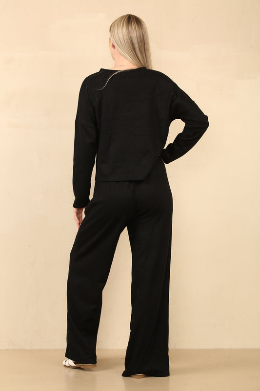 Ensemble élégant tissu texturé doux un haut coupe décontractée et un pantalon large à cordon de serrage assorti, parfait pour un style sans effort et un confort décontracté Ref-8953